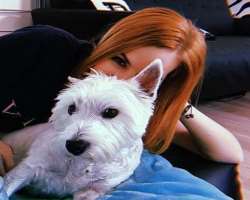 Rosie and her wife also have a cute furry member in their family.